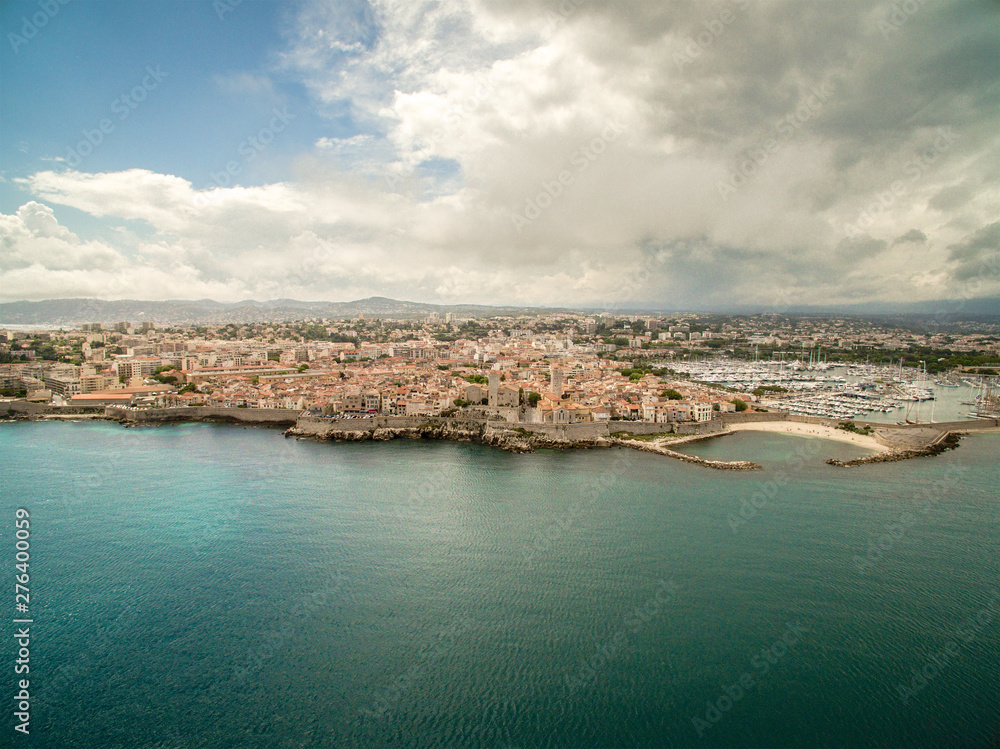 Aerial view of Antibes city & port during summer day. Antibes is a city located on the French Riviera or Cote d'Azur in France. Europe