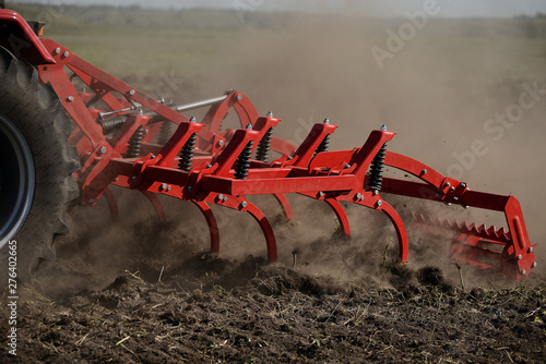 Agricultural plow close-up on the ground, agricultural machinery. © mishadp