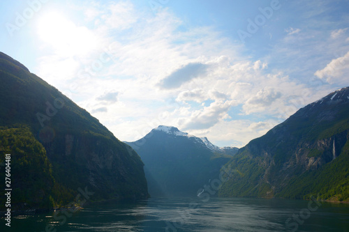 geirangerfjord with the seven sisters and rock scenery, backlit scenery in geirang in norway