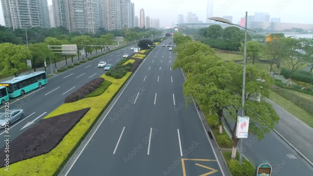 Aerial view of cars running on the city road at sunset, China. Aerial view of cars running on the city road at sunset, China.