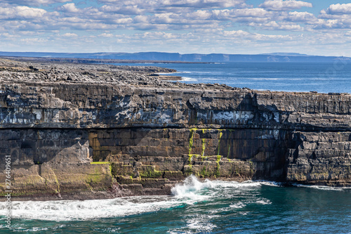 Cliff in Inishmore with Cliffs of Moher in background