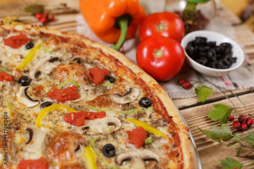 Vegetarian pizza on wooden table