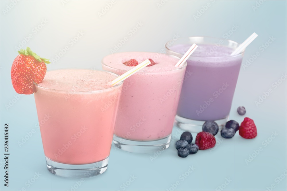 Fruit Smoothies with Straws Isolated on a White Background Fruit Smoothies with Straws Isolated on a White Background
