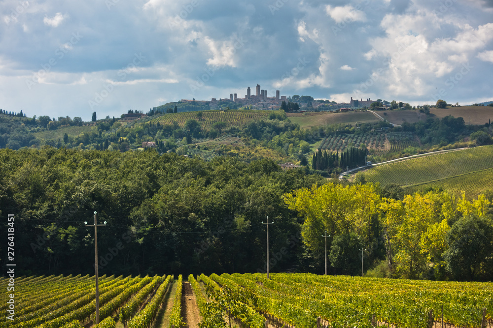 Hiking hills, backroads and vineyards at autumn, near San Gimignano in Tuscany, Italy