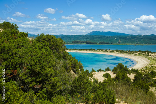 Voidokilia Beach  popular white sand and blue clear water beach in Messinia in Mediterranean area in shape of Greek letter omega  Peloponnese  Greece.