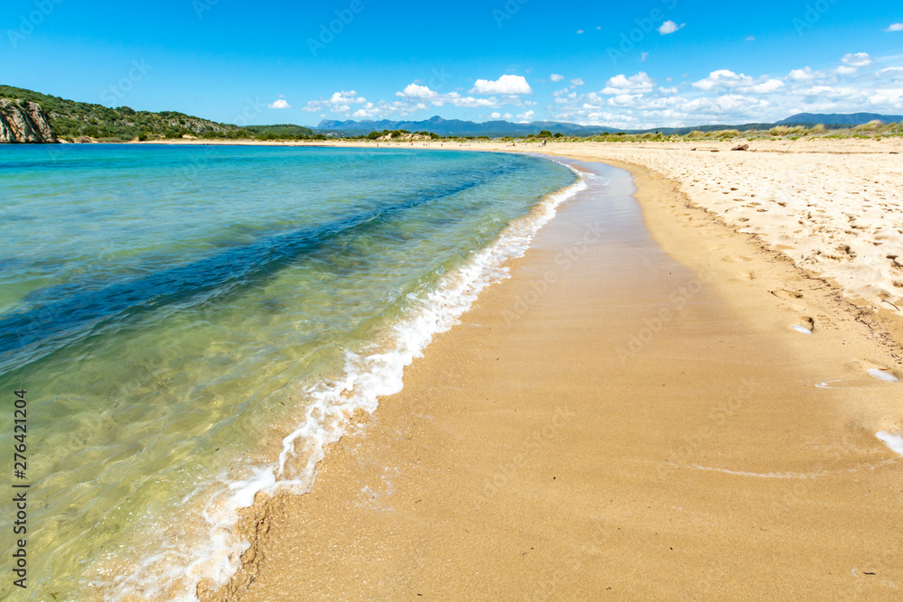Voidokilia Beach, popular white sand and blue clear water beach in Messinia in Mediterranean area in shape of Greek letter omega, Peloponnese, Greece. Voidokilia Beach, popular white sand and blue clear water beach in Messinia in Mediterranean area in shape of Greek letter omega, Peloponnese, Greece.