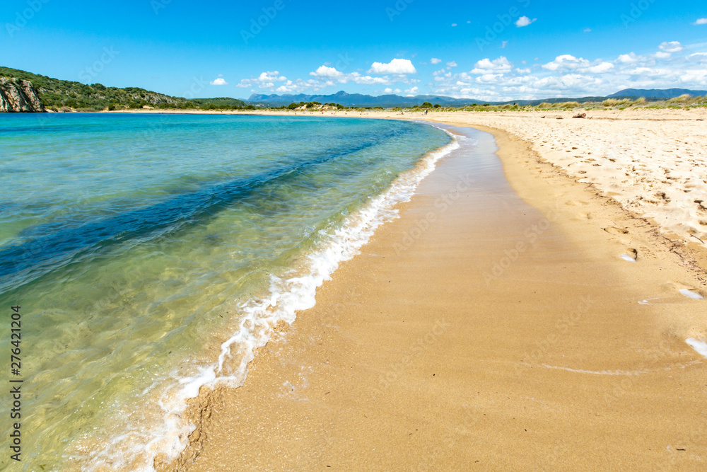 Voidokilia Beach, popular white sand and blue clear water beach in Messinia in Mediterranean area in shape of Greek letter omega, Peloponnese, Greece.