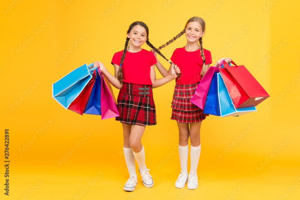 Perfect day. school girls with packages. purchase. black friday. holiday presents. Sale and discount. girls shopping. happy children with shopping bags. successful shopping. big sales Perfect day. school girls with packages. purchase. black friday. holiday presents. Sale and discount. girls shopping. happy children with shopping bags. successful shopping. big sales
