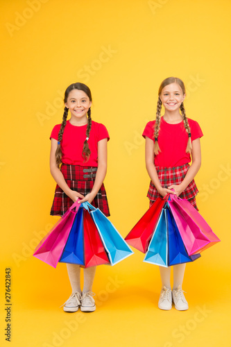 Thanks for your purchase. girls shopping. happy children with shopping bags. successful shopping. big sales. school girls with packages. purchase. black friday. holiday presents. Sale and discount