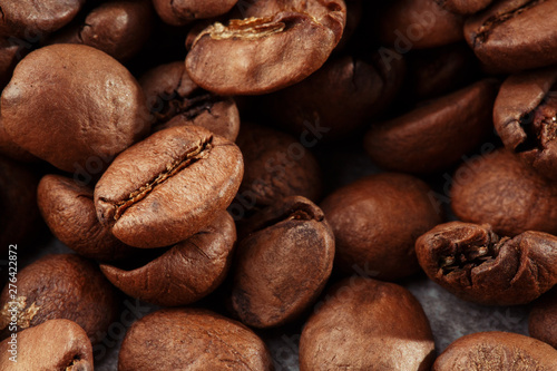 Isolated coffee bean. closeup photo. Top view. Roasted coffee beans background