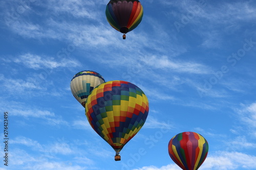 Several Hot Air Balloons with cyrus clouds