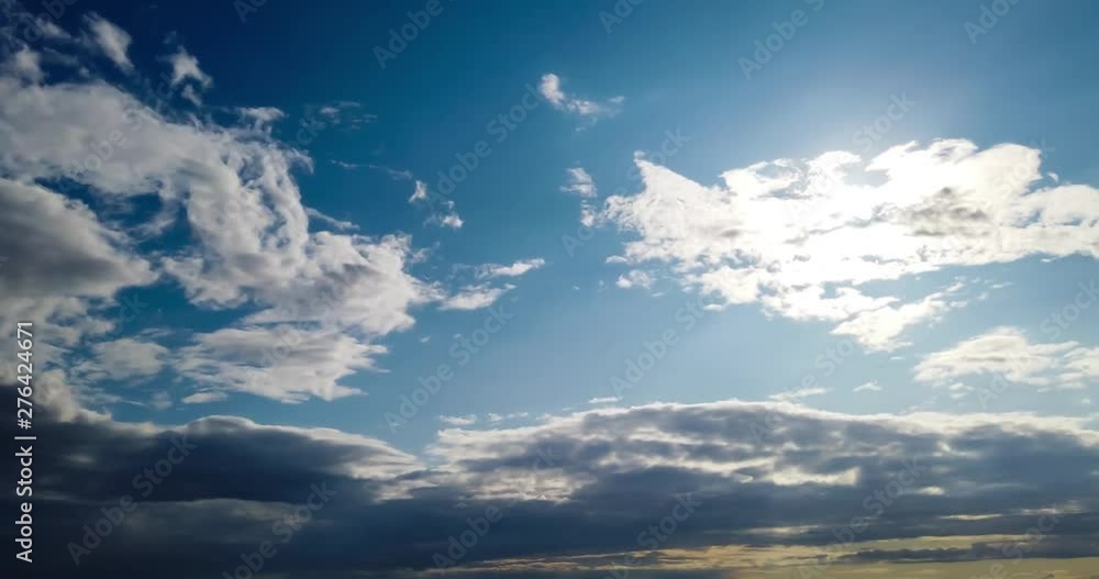 Timelapse of beautiful dramatic sunset with dramatic sky and colorful fluffy clouds. 4K time lapse clip Timelapse of beautiful dramatic sunset with dramatic sky and colorful fluffy clouds. 4K time lapse clip