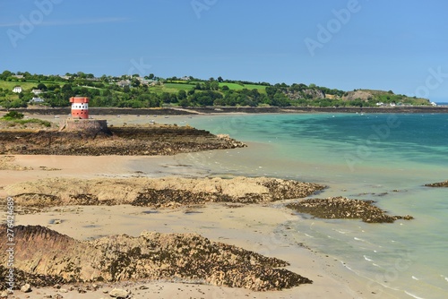 St Catherine Bay and Archirondel, Jersey, U.K. Picturesque beach at low tide in the Summer. photo