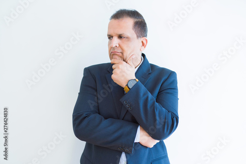 Middle age man thinking clueless about a question
