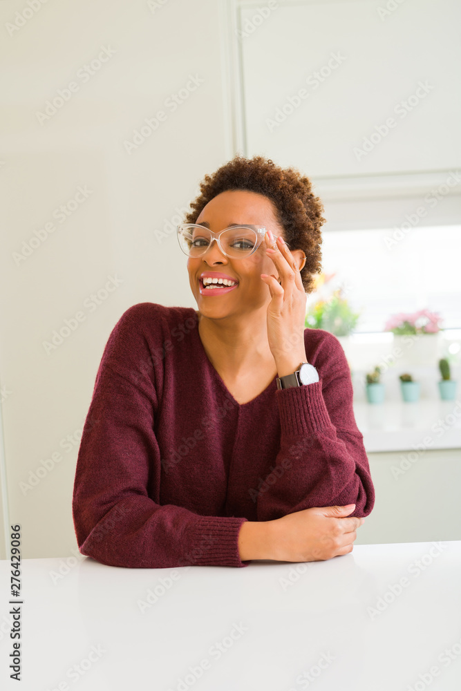 Beautiful young african woman with afro hair wearing glasses Beautiful young african woman with afro hair wearing glasses
