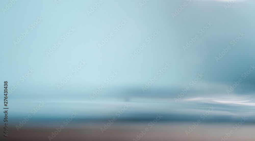 Fototapeta premium Blurred beach with bokeh sunlight wave abstract background. Vintage tone