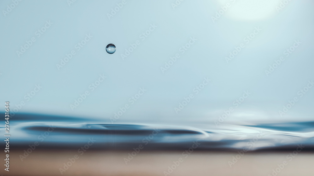 a drop on the surface of the water. One second before... a drop on the surface of the water. One second before...