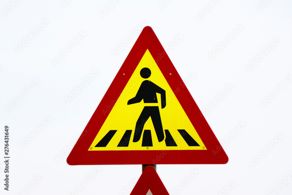 sign for pedestrians walking along the road, yellow and red board with white background sign for pedestrians walking along the road, yellow and red board with white background