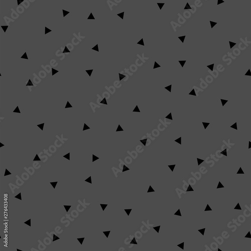 Triangles seamless pattern. Randomly distributed triangle texture background.