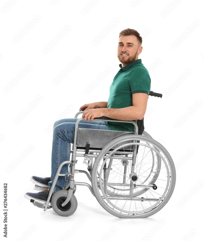 Handsome young man in wheelchair isolated on white Handsome young man in wheelchair isolated on white
