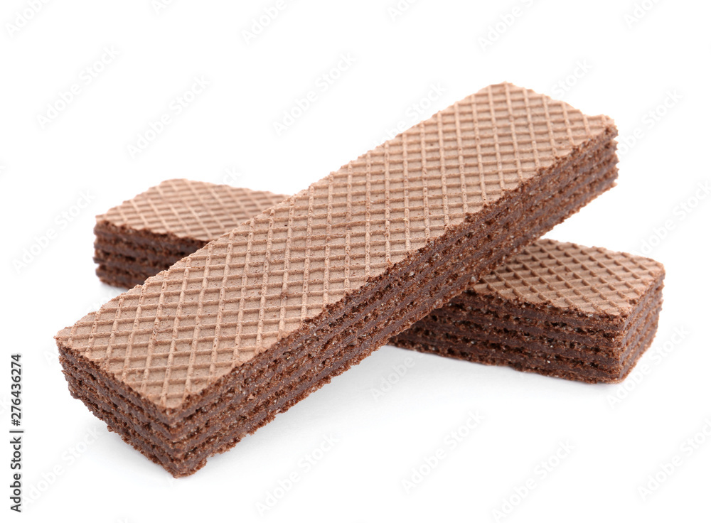 Delicious crispy wafers on white background. Sweet food Delicious crispy wafers on white background. Sweet food