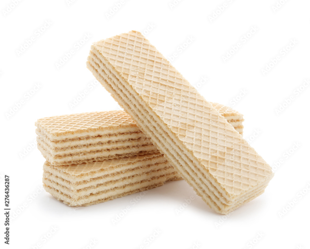 Delicious vanilla wafer sticks isolated on white Delicious vanilla wafer sticks isolated on white