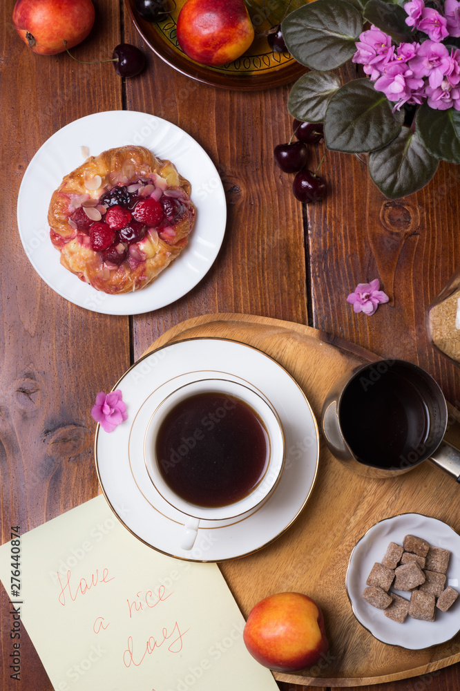 happy morning . life style shot with coffee, berry cake and fruits happy morning . life style shot with coffee, berry cake and fruits