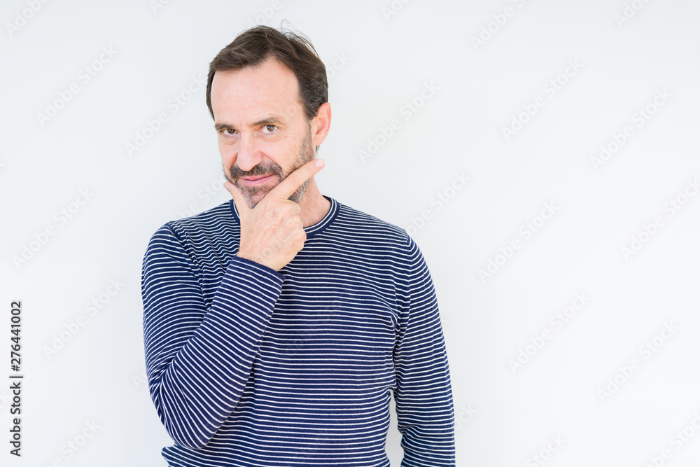 Handsome senior man over isolated background looking confident at the camera with smile with crossed arms and hand raised on chin. Thinking positive. Handsome senior man over isolated background looking confident at the camera with smile with crossed arms and hand raised on chin. Thinking positive.