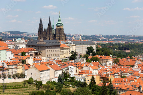 Summer Prague City with gothic Castle and the green Nature from the Hill Petrin, Czech Republic