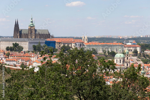 Summer Prague City with gothic Castle and the green Nature from the Hill Petrin, Czech Republic