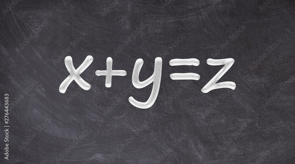 Obraz premium X plus Y equals Z written on blackboard