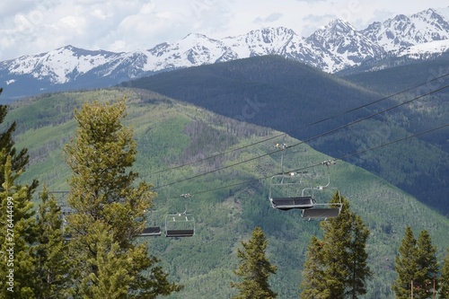 A ski lift goes up the side of a mountain during summer in Veil, Colorado.