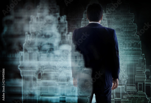 asian business man with architecture design hologram