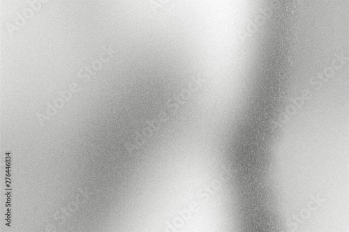 Light shining on silver wave metal wall, abstract texture background