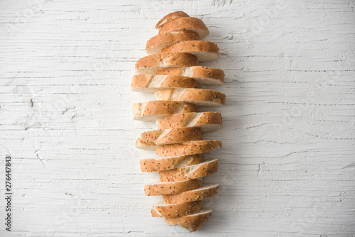 sliced bread on wooden background