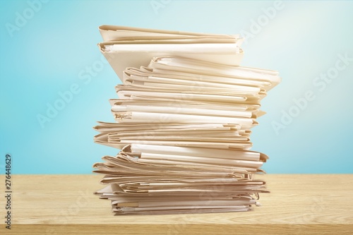 Stack of papers isolated on white background