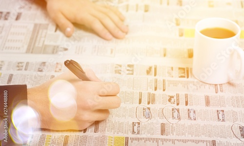 Closeup of a Person Looking at Classified Ads