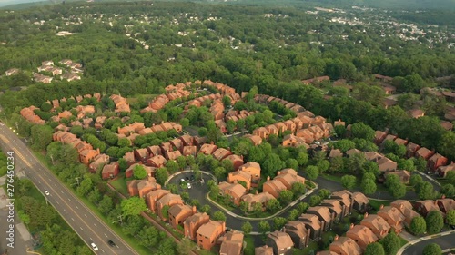 Late afternoon, forward moving drone footage of a suburban community in New Jersey. photo