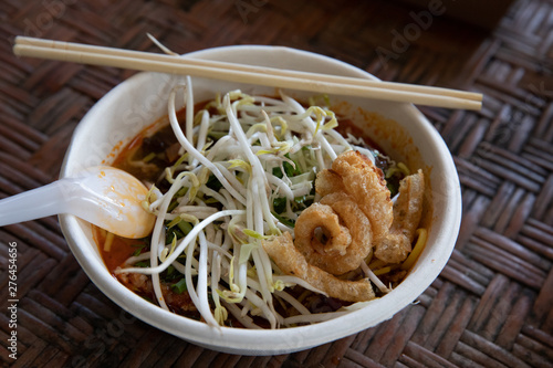 Nam Nguan Noodle Northern Thai food on bamboo mat. photo