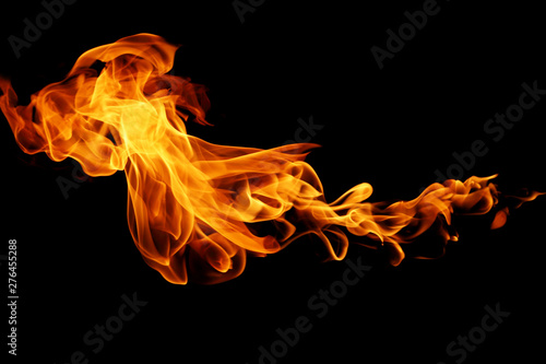 movement of fire flames isolated on black background. photo