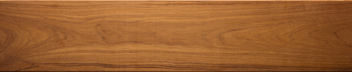 Teak wood (Tectona grandis)  wood texture, in wide format. Raw unfinished surface. Prized wood for durability and water resistance due to it's natural oils.