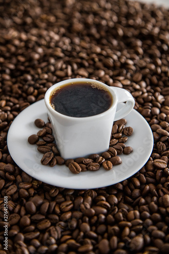 Natural Light cup of coffee with beans © @altonphoto