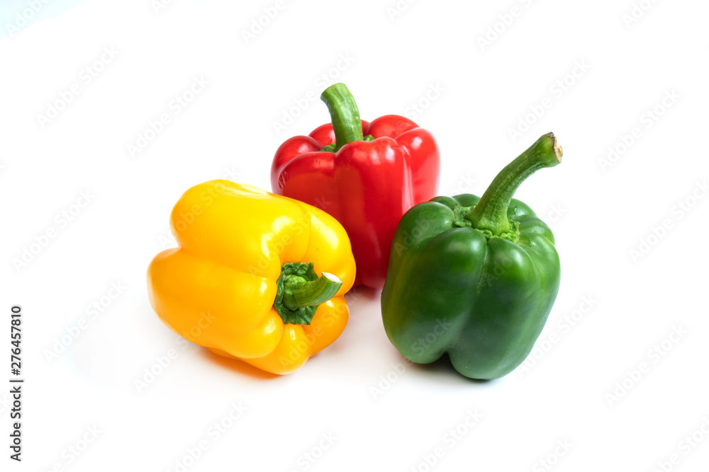 Fresh three color sweet peppers isolated on white background Fresh three color sweet peppers isolated on white background
