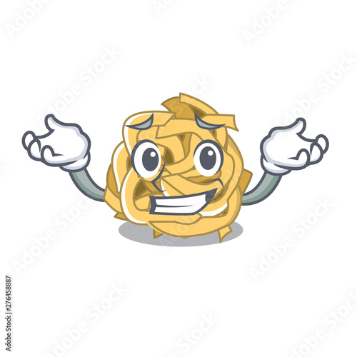 Grinning fettuccine is served on cartoon plate