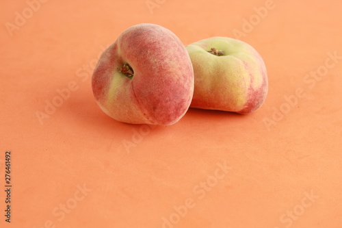 Paraguayan peach on colorful background photo