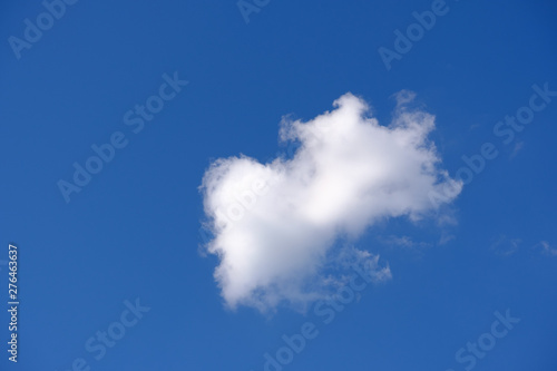 White clouds with a blue sky background