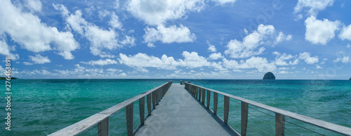 panorama on Deck in middle of a turquoise Caribbean sea with blue sky