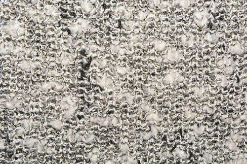 The texture of the knitted gray fabric for the background  