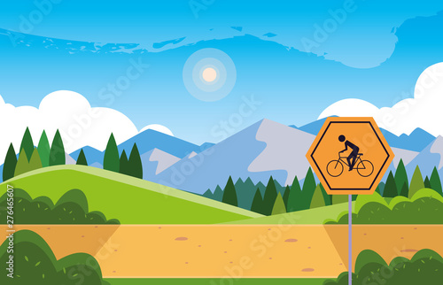 landscape mountainous with signage for cyclist