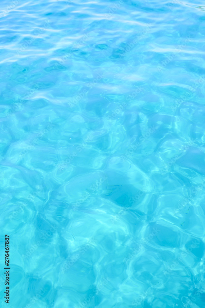 Close-up view of a transparent turquoise sea water that forms a natural texture, Emerald Coast, Sardinia, Italy. Close-up view of a transparent turquoise sea water that forms a natural texture, Emerald Coast, Sardinia, Italy.